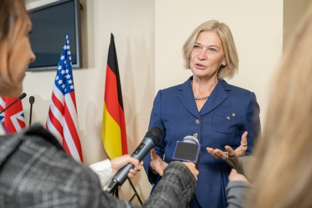 Contemporary female politician giving interview at press conference