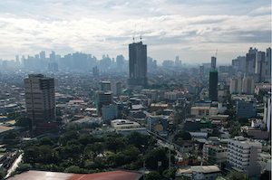 The skyline of Metro Manila’s business district, with some visible haze caused by air pollution.