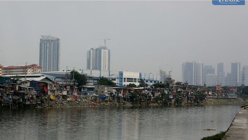Image of Manila skyline shows how air pollution impacts the population and public health.